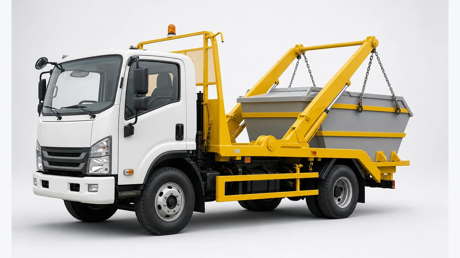 Camion porte-bennes à bras latéraux